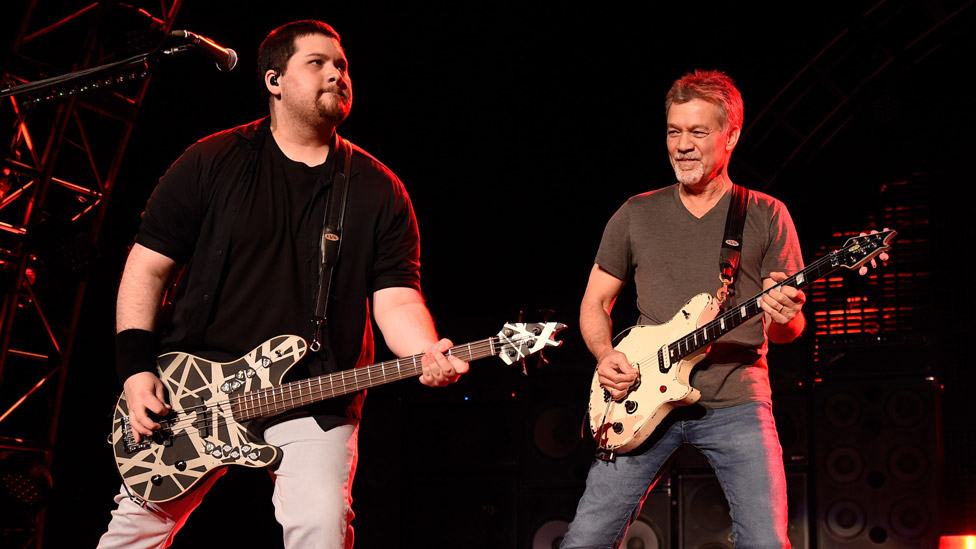 Image of an American musician, Wolfgang Van Halen and his father