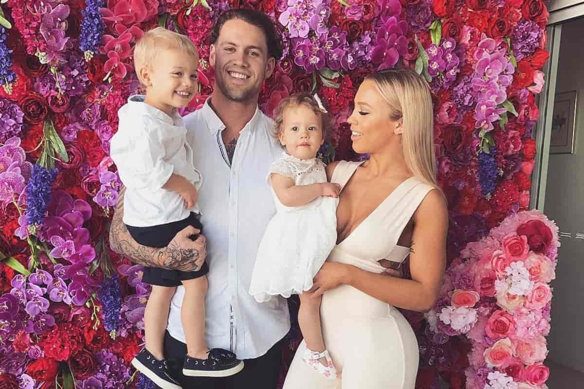 Fitness model Tammy Hembrow with her fiance and children.