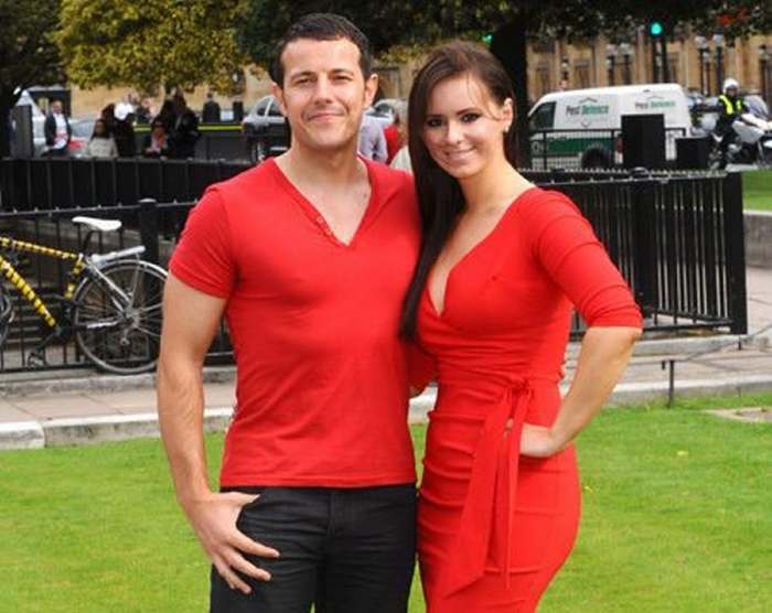 Lee Latchford in red dress with his wife, Kerry Lucy Taylor